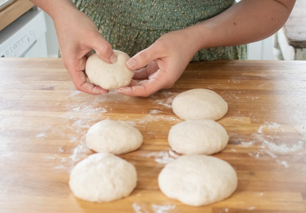 adding holes to bagel dough