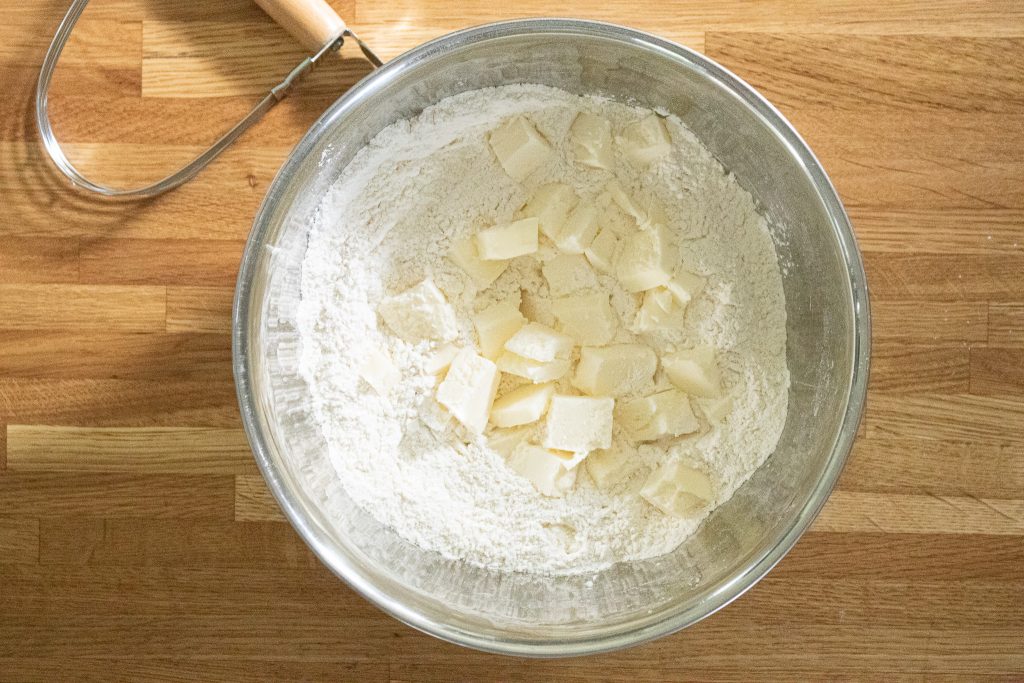 biscuit batter with butter cubes