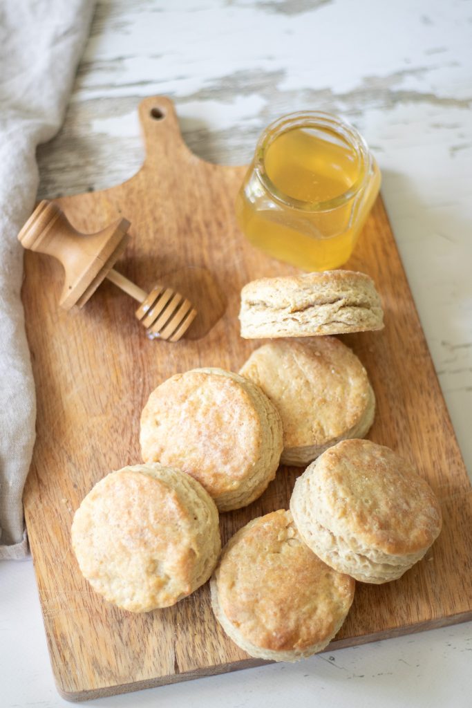 Golden Buttermilk Sourdough Biscuits served with honey